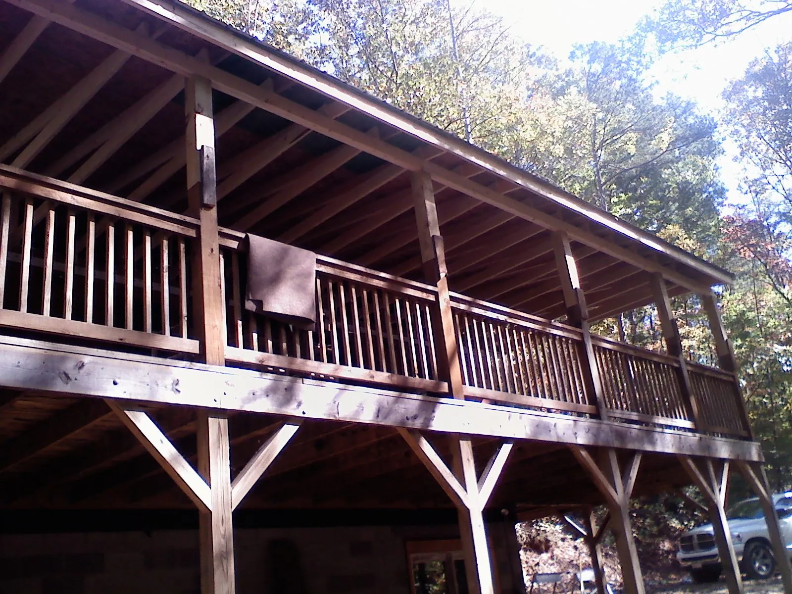 Timber framing under a new elevated porch and deck — Roof Leak Repair in Pearland by Roofing Brothers